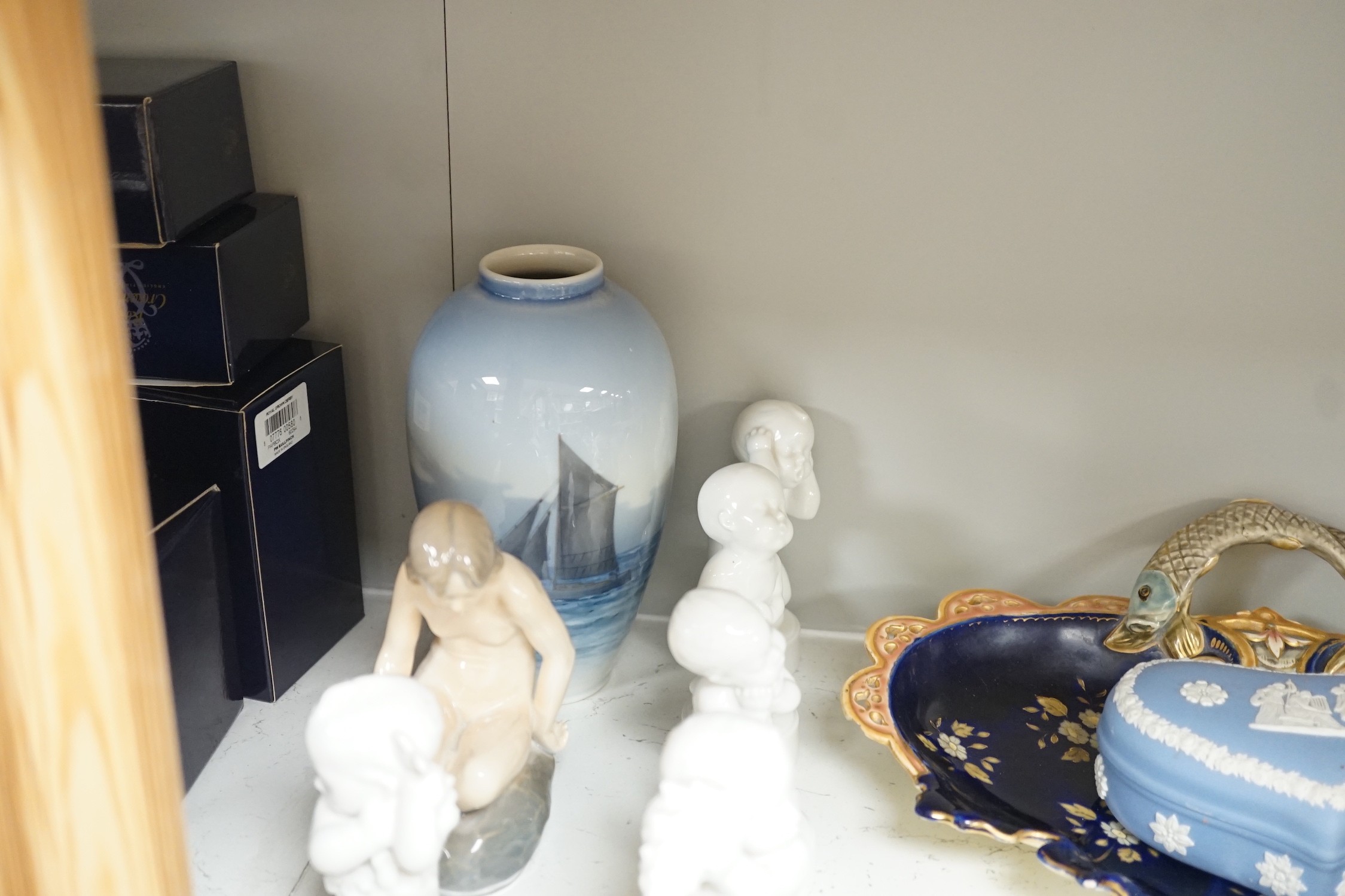 A Royal Copenhagen vase, various dishes and four ornaments, ten Bing & Grondahl figures, two Wedgwood jasperware pots and other ceramics, tallest 18cm